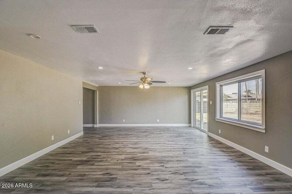 3640 West Banff Ln. Phoenix, AZ 85053 - Photo 12 of 26 Living Room Unfurnished
