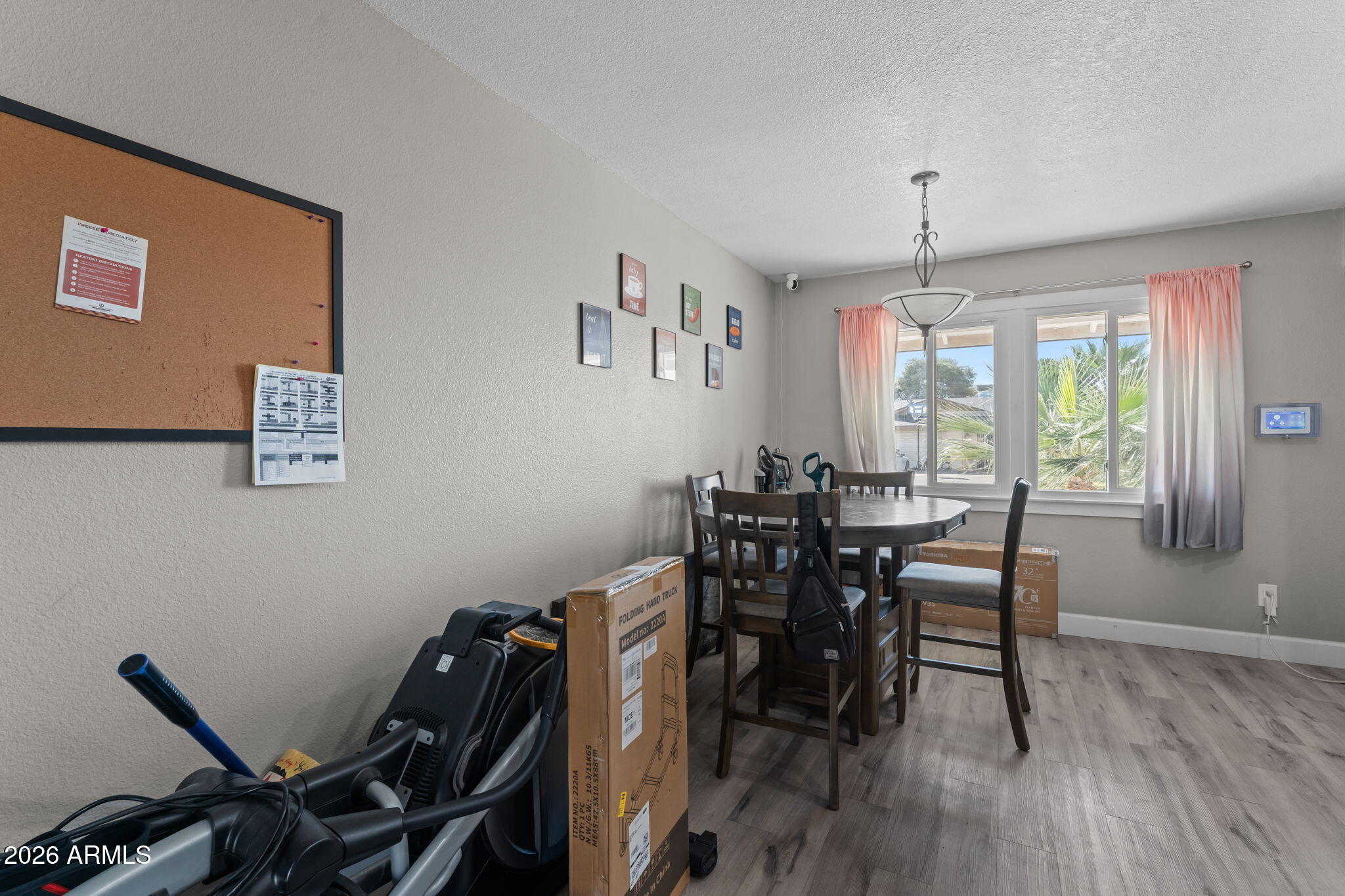3640 West Banff Ln. Phoenix, AZ 85053 - Photo 8 of 26 Kitchen Dining Area