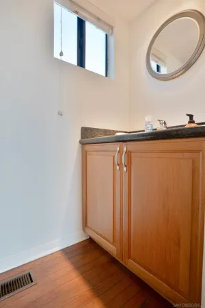 a view of empty room with window and fireplace