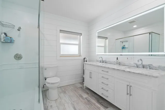 a view of a chairs and table in patio