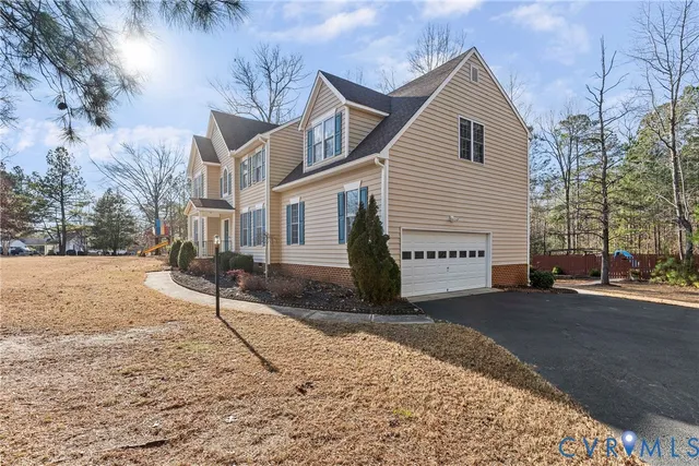 a view of a fire pit with flower garden