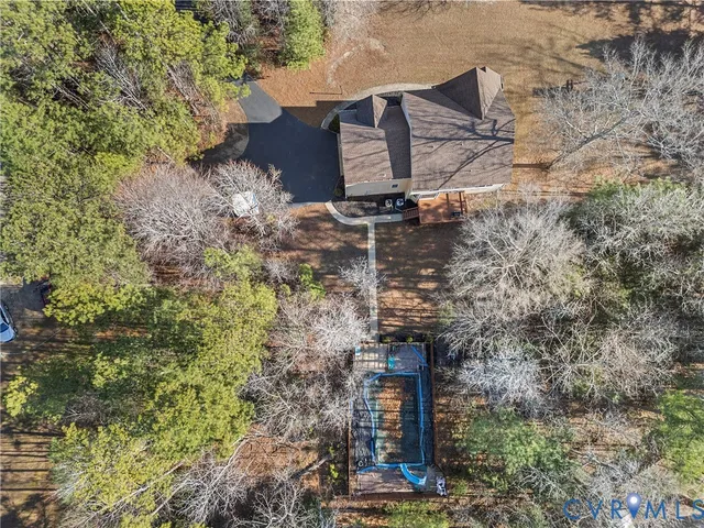 a view of a town with large trees