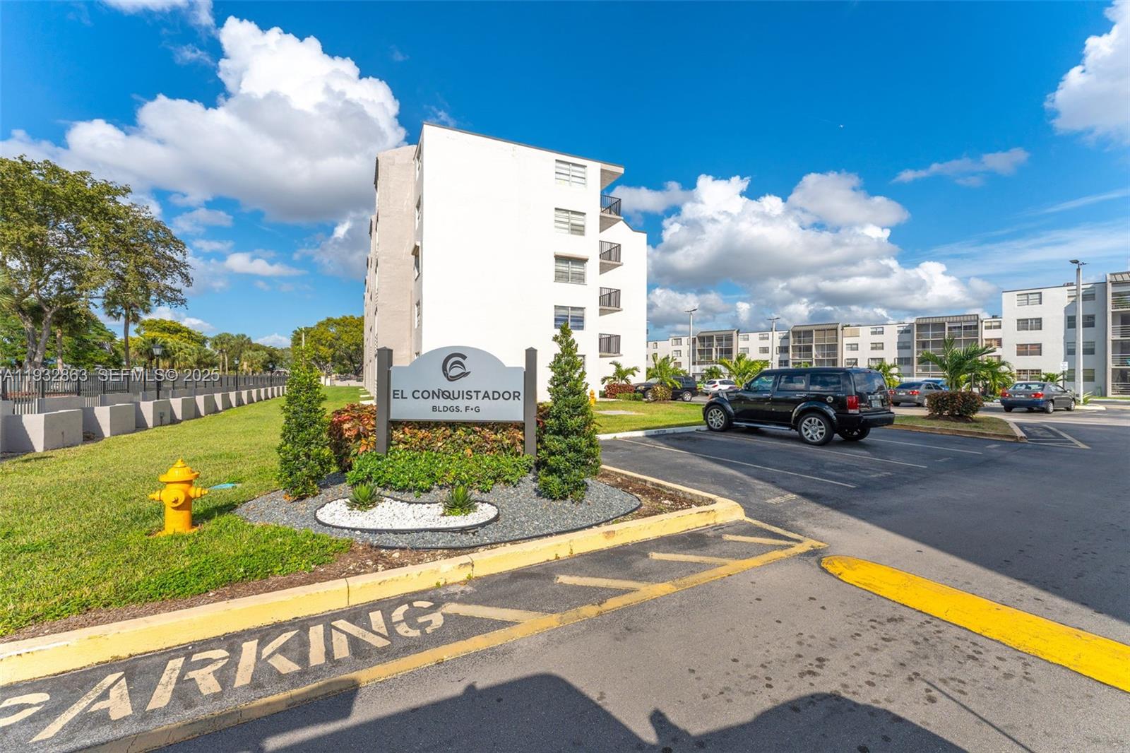 14180 Southwest 84th Street, Unit 508G Miami, FL 33183 - Photo 1 of 32 a view of a street with a building in the background