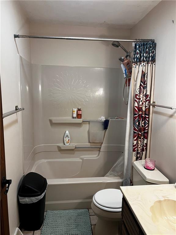 145 Coffman Road Acme, PA 15610 - Photo 18 of 37 a bathroom with a granite countertop bathtub shower sink vanity and toilet