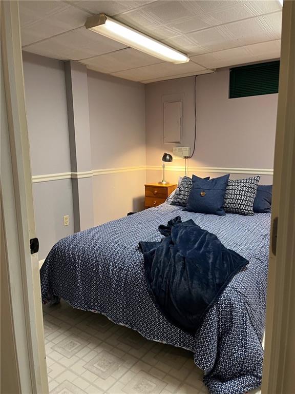 145 Coffman Road Acme, PA 15610 - Photo 21 of 37 a bedroom with a bed and window