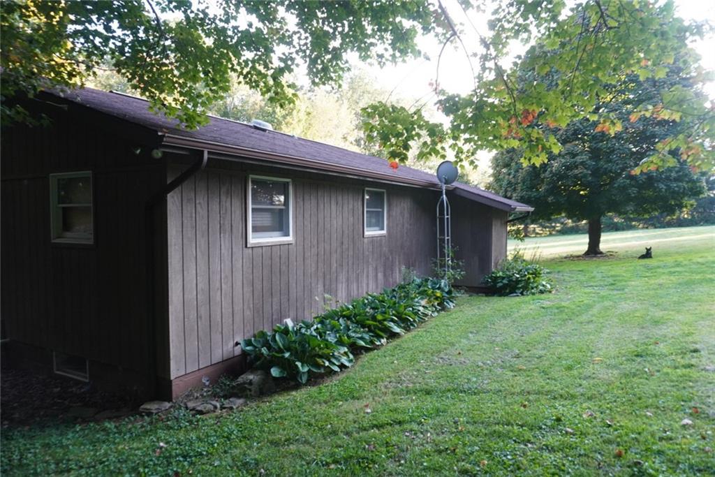145 Coffman Road Acme, PA 15610 - Photo 31 of 37 a view of a back yard of the house