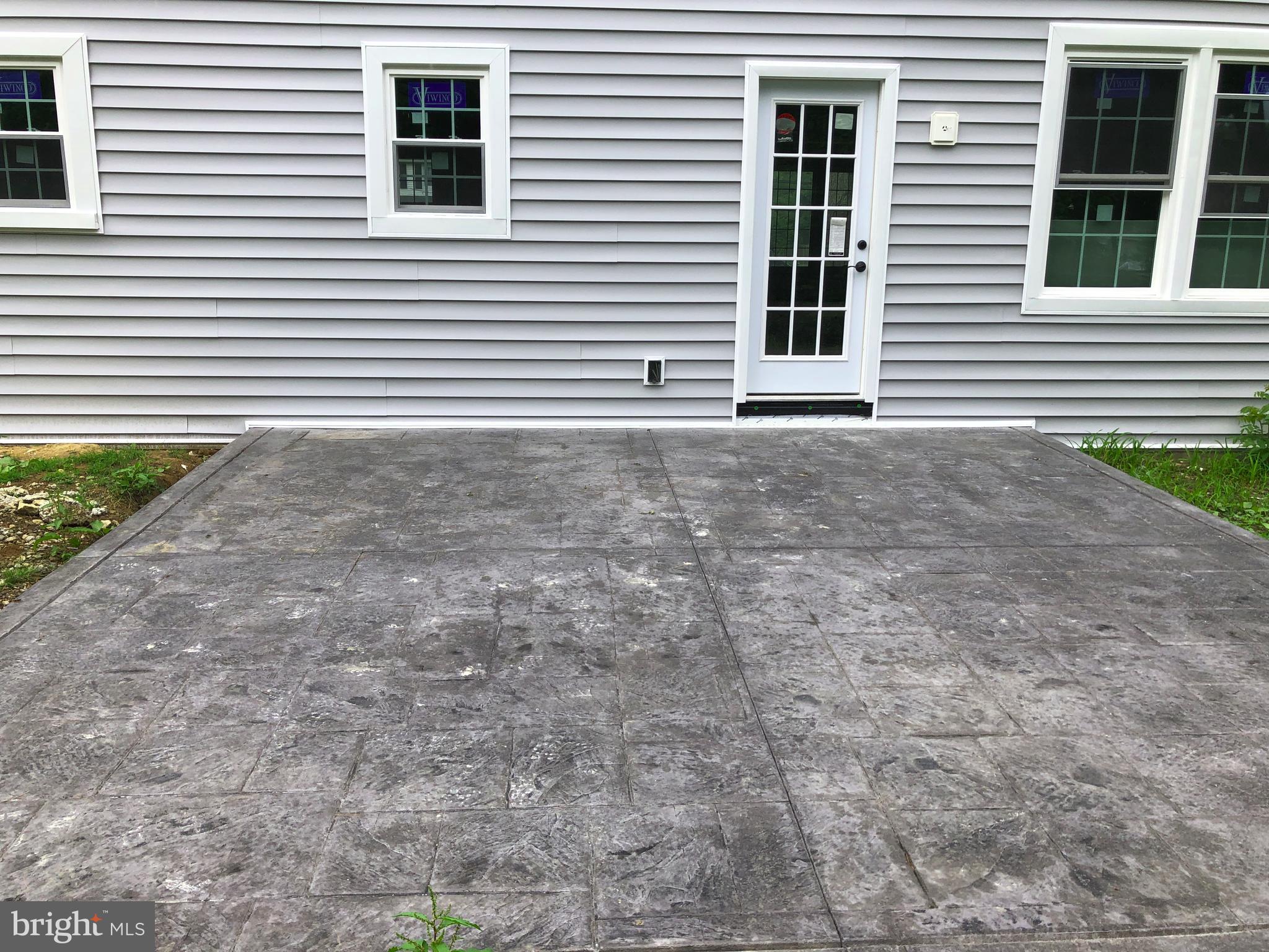 126 Glendale Road Exton, PA 19341 - Photo 33 of 37 New stamped concrete patio