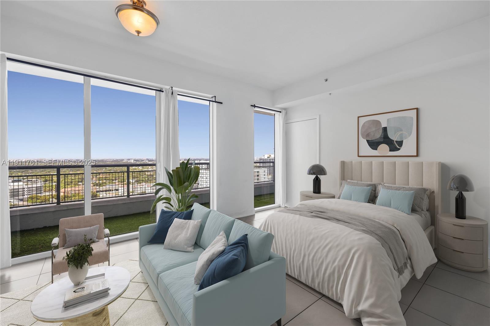 60 Southwest 13th Street, Unit 2119 Miami, FL 33130 - Photo 2 of 23 a living room with furniture and a large window