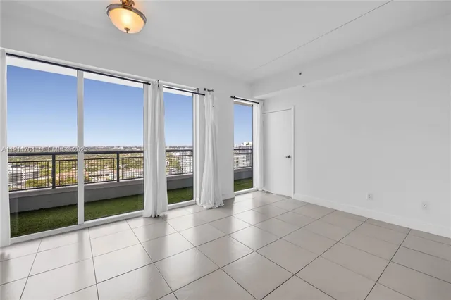 an empty room with windows