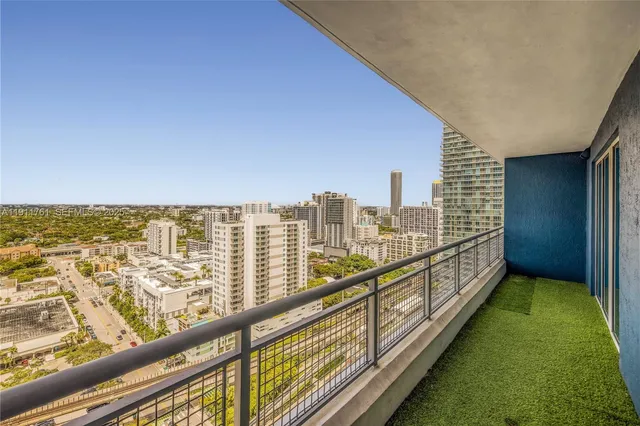 a view of balcony with city