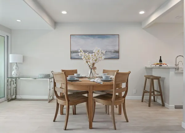 a view of a dining room with furniture