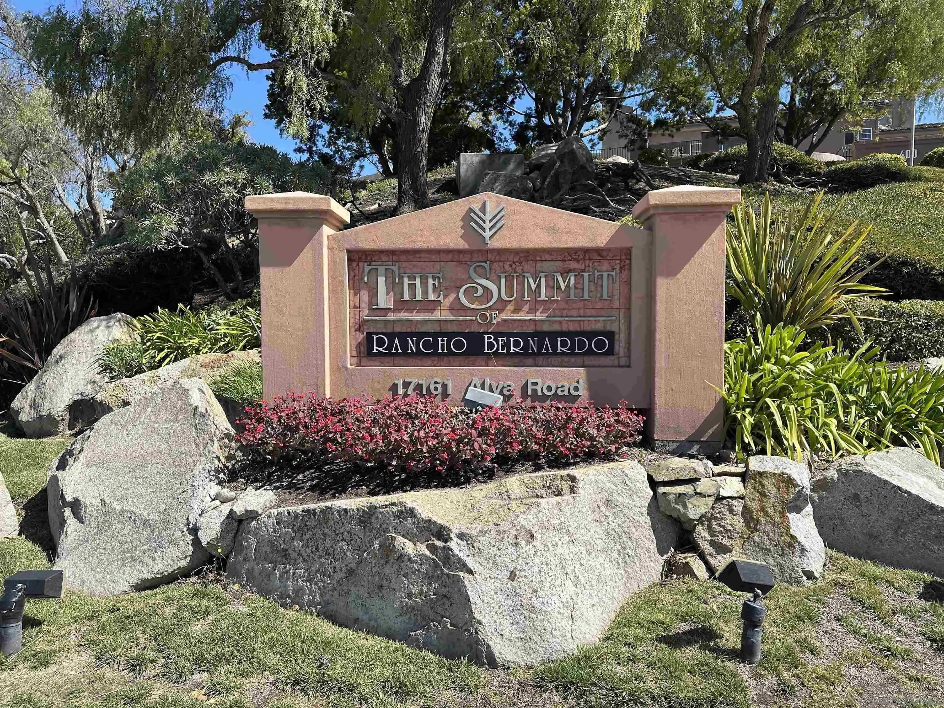 17161 Alva Road, Unit 1424 San Diego, CA 92127 - Photo 6 of 10 a view of a sign board with flower plants
