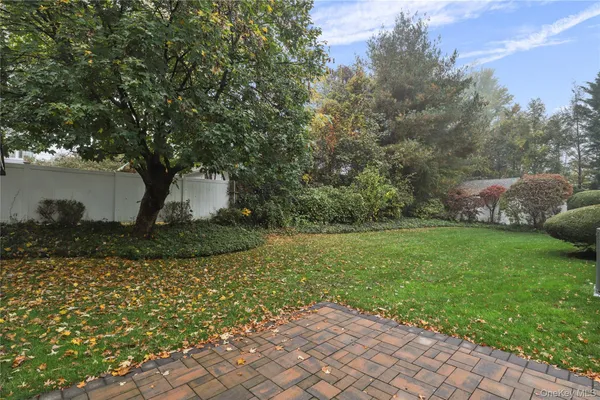 a view of a garden with a fountain