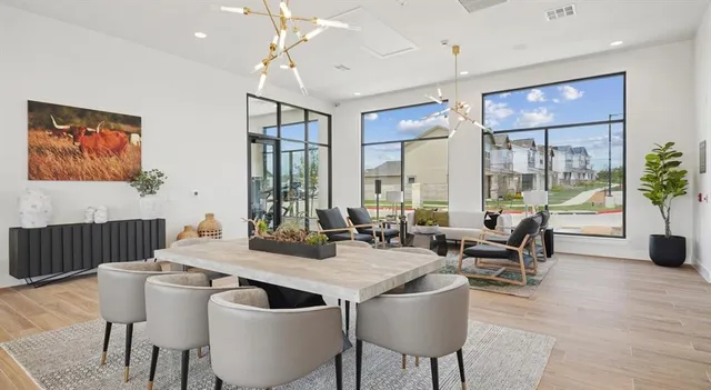 a view of a dining room with furniture window and outside view