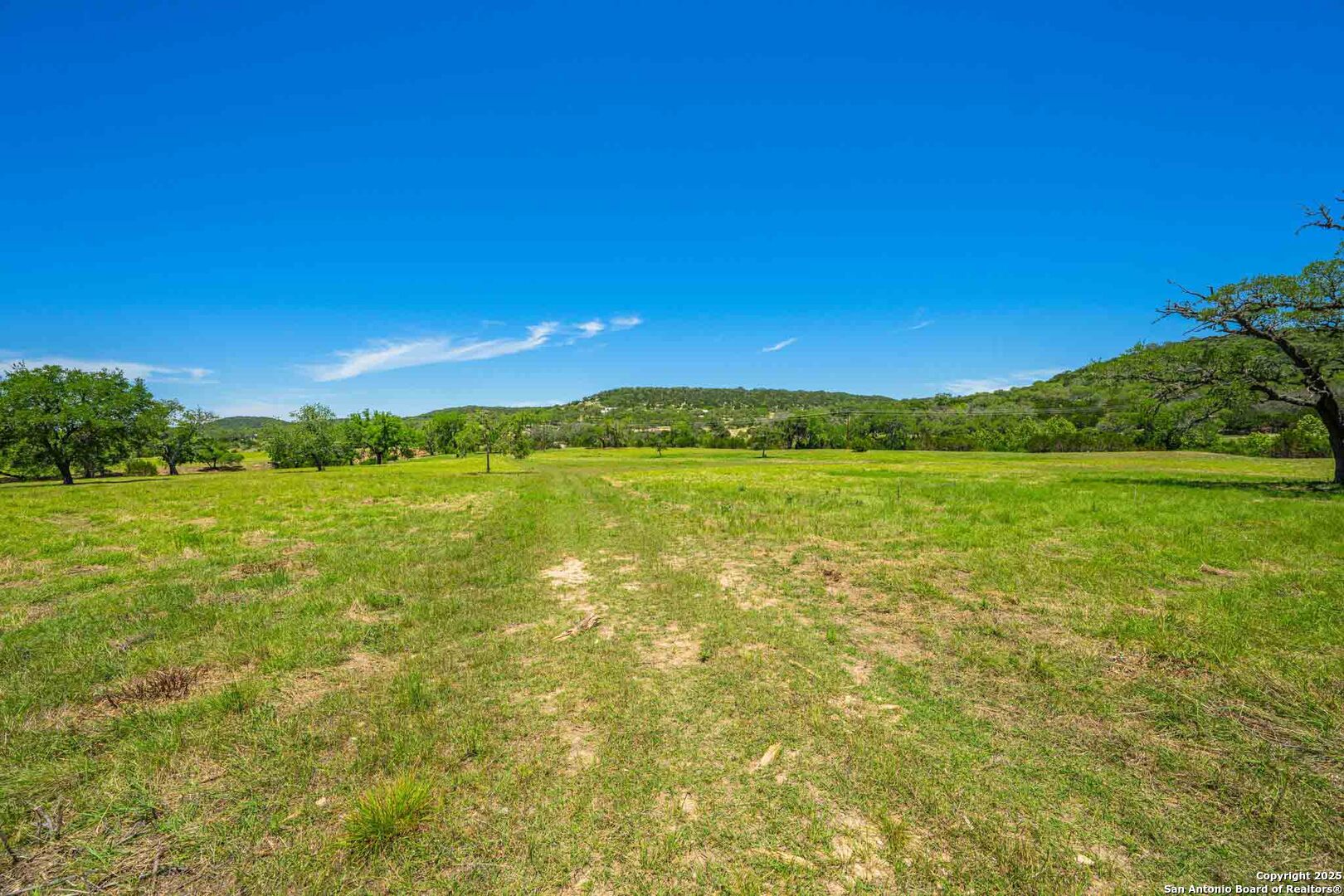 171 Flach Road Comfort, TX 78013 - Photo 68 of 91 a view of an ocean and a yard
