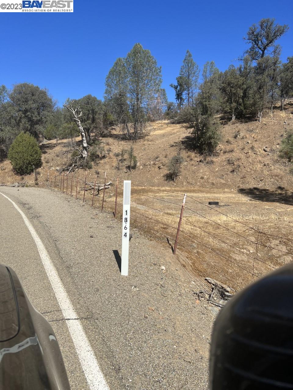 a view of a dry yard with a snow