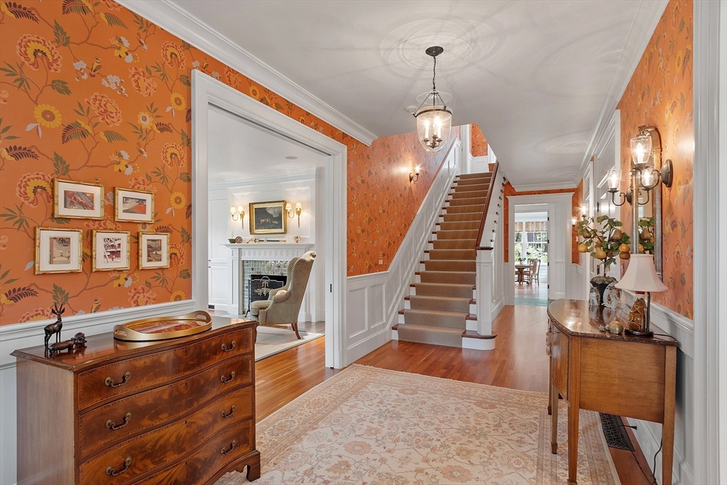 76 Red Coat Lane Concord, MA 01742 - Photo 17 of 42 a dining room with wooden floor and furniture