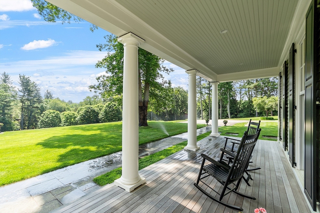 76 Red Coat Lane Concord, MA 01742 - Photo 3 of 42 a view of a yard with furniture and garden
