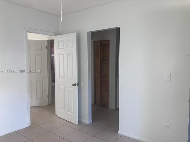 3698 William Avenue, Unit 6 Miami, FL 33133 - Photo 5 of 7 an empty room with closet
