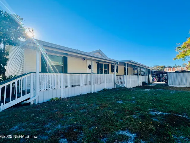 a house view with a garden space