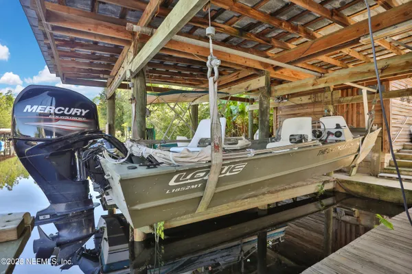 a close view of a sink a faucet and a cabinet in a kitchen