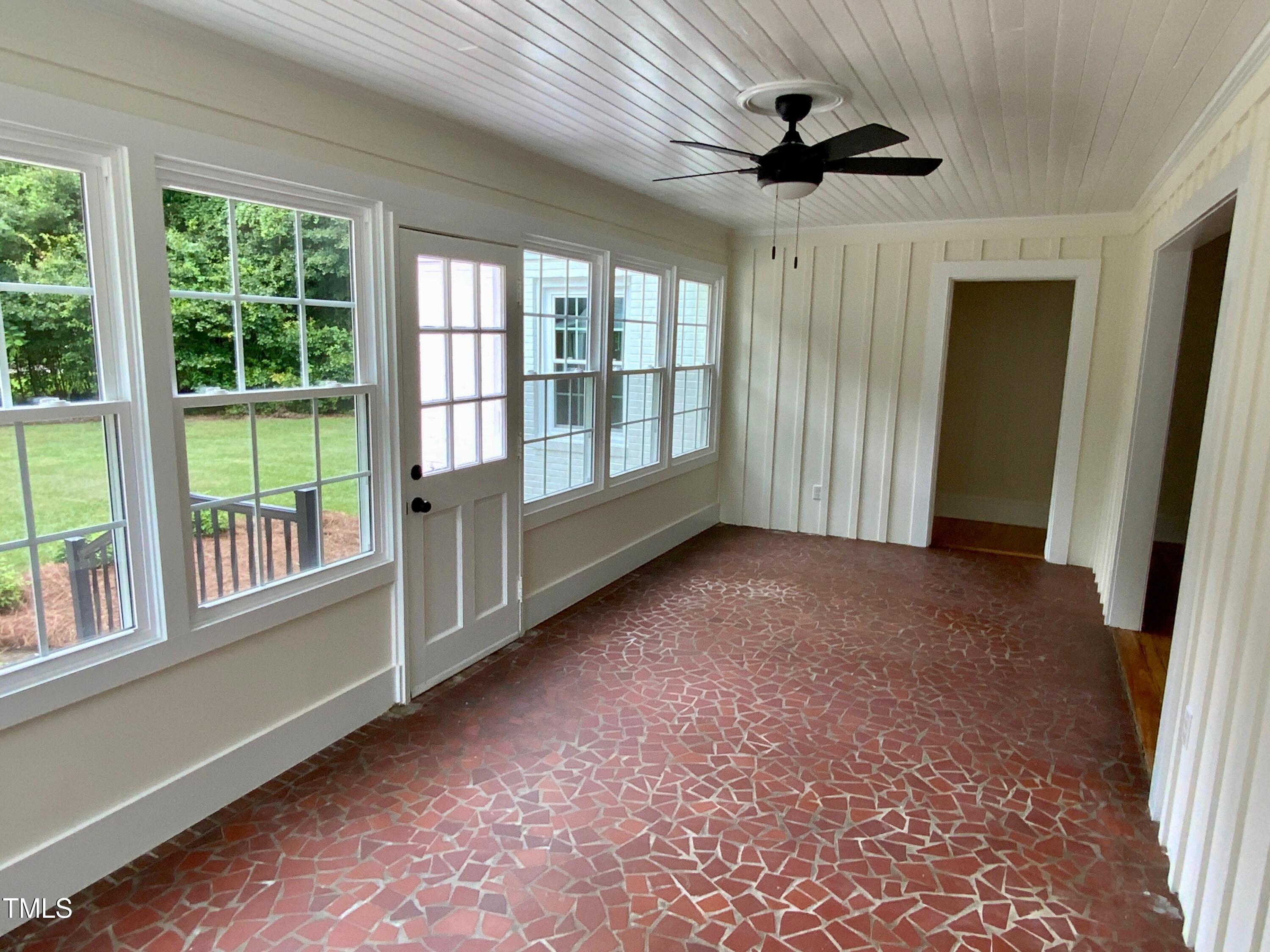 1101 West Divine Street Dunn, NC 28334 - Photo 26 of 36 an empty room with windows