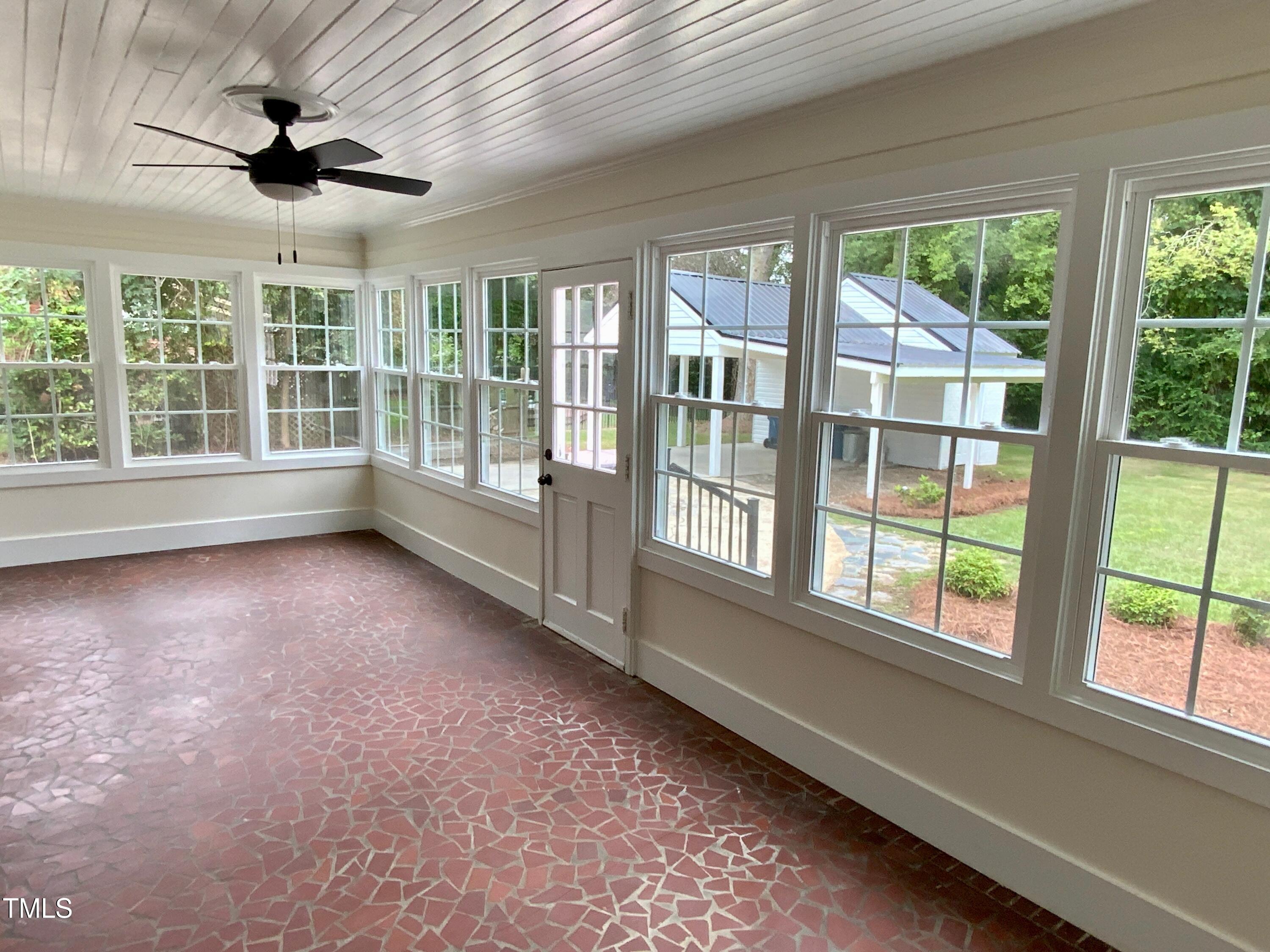 1101 West Divine Street Dunn, NC 28334 - Photo 29 of 36 a view of an empty room with a window