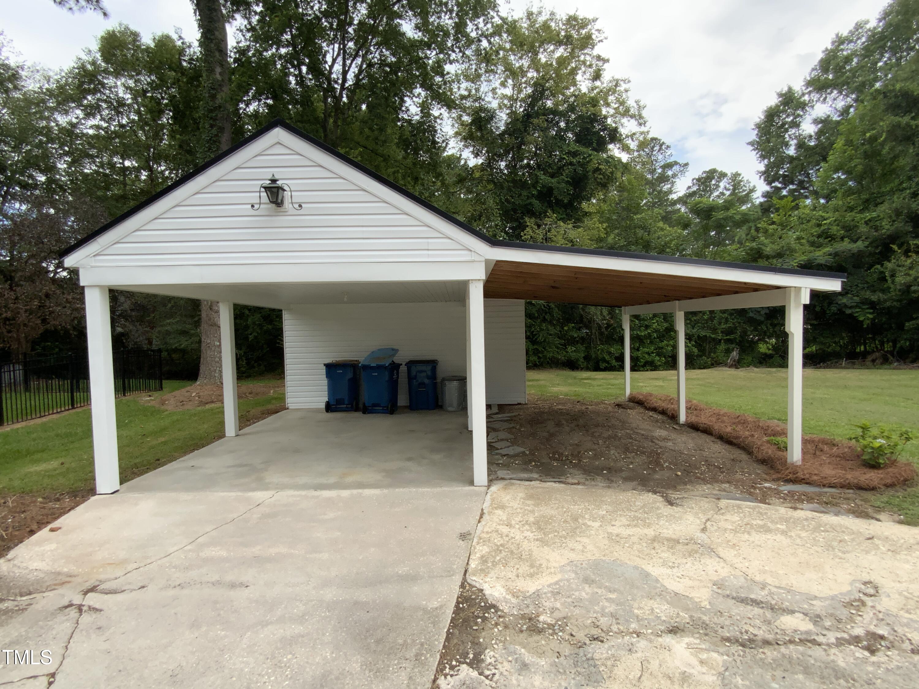 1101 West Divine Street Dunn, NC 28334 - Photo 30 of 36 a view of backyard with green space