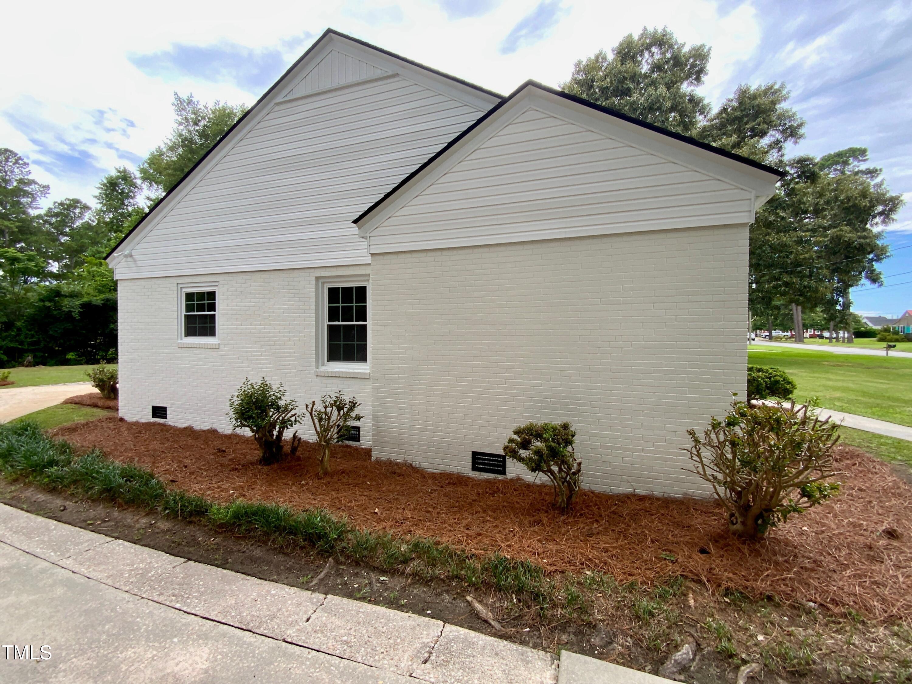 1101 West Divine Street Dunn, NC 28334 - Photo 34 of 36 a backyard of a house