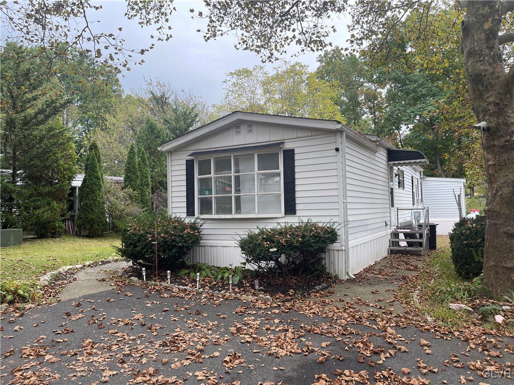 14 Brookside Drive Bath, PA 18014 - Photo 2 of 17 a front view of a house with garden