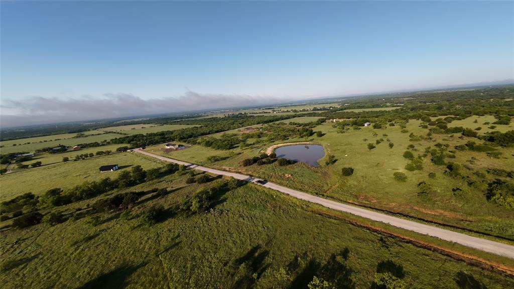 1009 Goodnight Trail Perrin, TX 76486 - Photo 12 of 14 an aerial view of residential houses with outdoor space