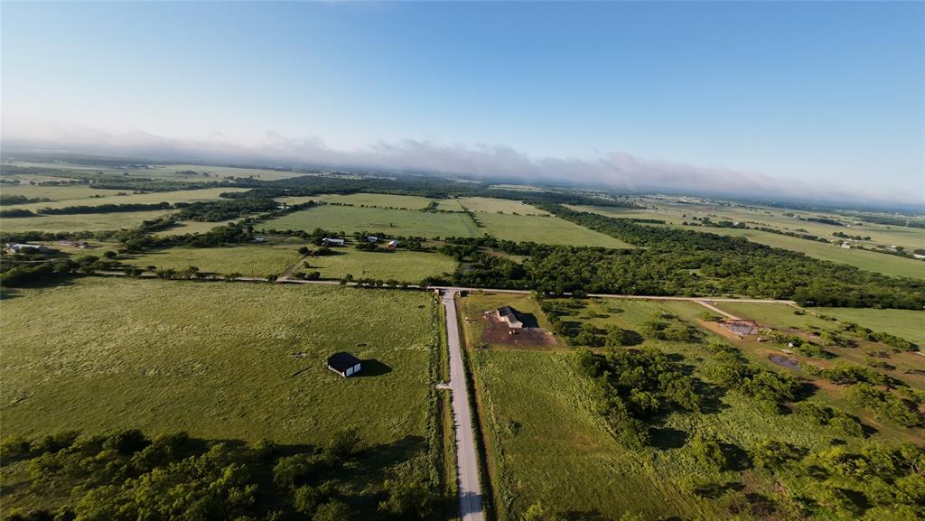 1009 Goodnight Trail Perrin, TX 76486 - Photo 14 of 14 an aerial view of ocean with residential houses with outdoor space