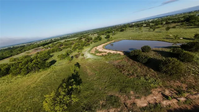 a view of mountains and valleys