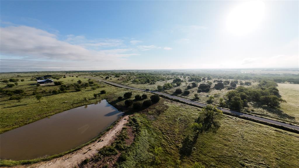 1009 Goodnight Trail Perrin, TX 76486 - Photo 6 of 14 an aerial view of a house with a lake view
