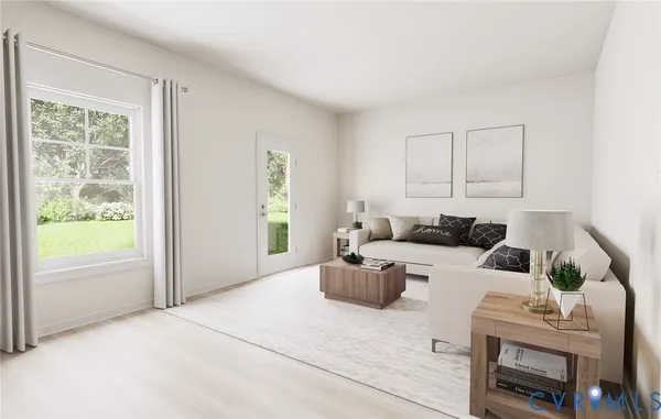 a living room with furniture and a window