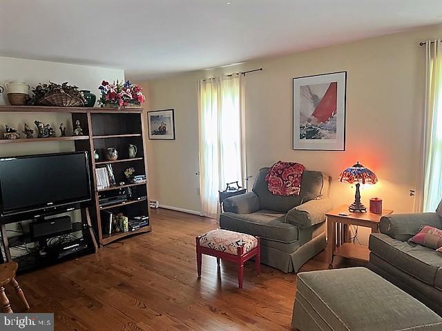 51 Moore Lane Falling Waters, WV 25419 - Photo 12 of 47 a living room with furniture cabinets and flat screen tv