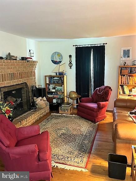 51 Moore Lane Falling Waters, WV 25419 - Photo 17 of 47 a living room with furniture and a fireplace