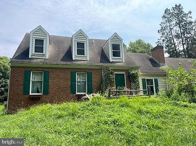 51 Moore Lane Falling Waters, WV 25419 - Photo 2 of 47 a front view of a house with a yard