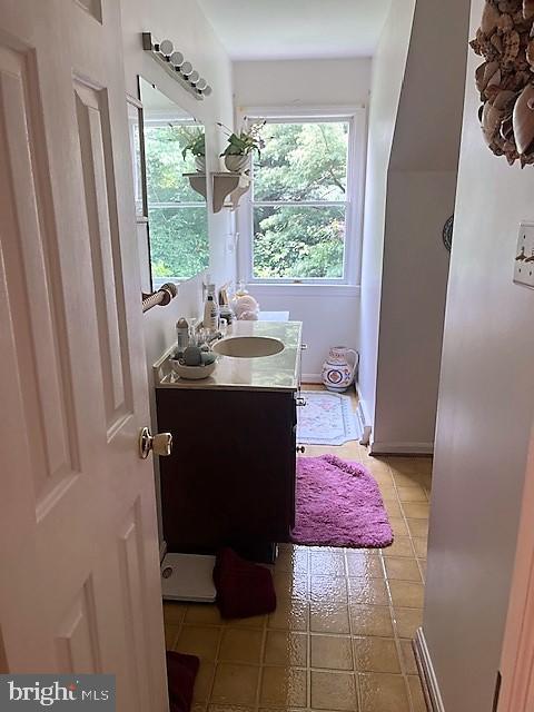51 Moore Lane Falling Waters, WV 25419 - Photo 28 of 47 a bath room with a sink a toilet and a tub
