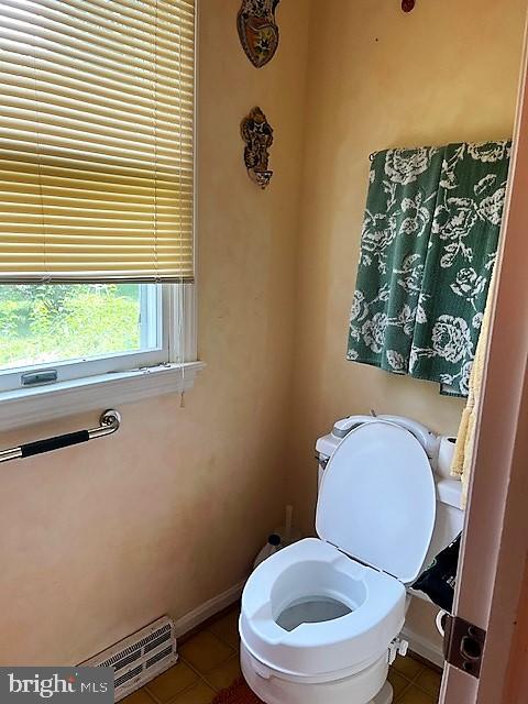 51 Moore Lane Falling Waters, WV 25419 - Photo 34 of 47 a white toilet sitting next to a window