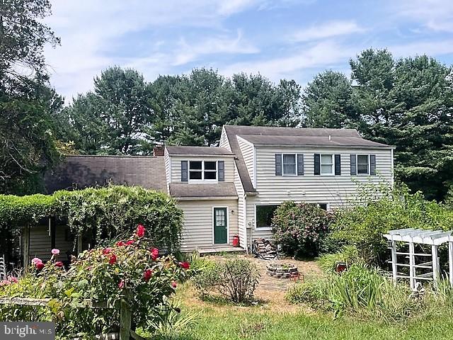 51 Moore Lane Falling Waters, WV 25419 - Photo 43 of 47 a house view with a garden space