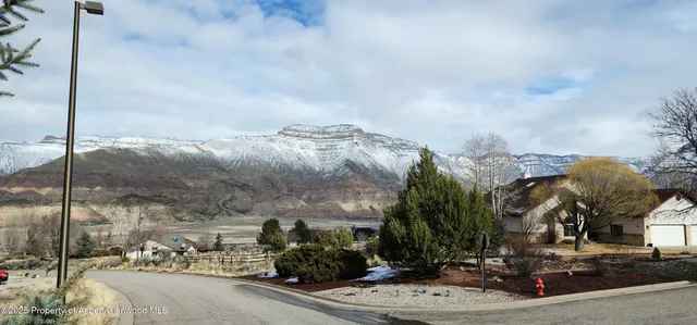 a vase of flowers sitting on a table