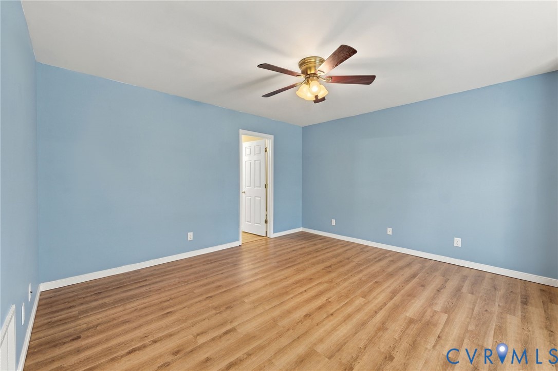 244 East Huntsman Road Sandston, VA 23150 - Photo 26 of 54 Expansive room featuring wood-finish flooring, a c