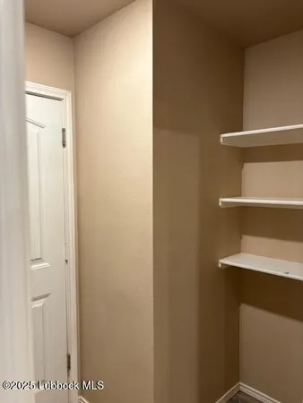 a bathroom with a toilet and a sink