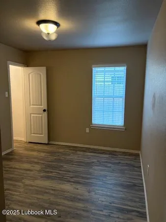 a view of gallery with wooden floor