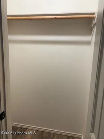 a room with a sink and a mirror