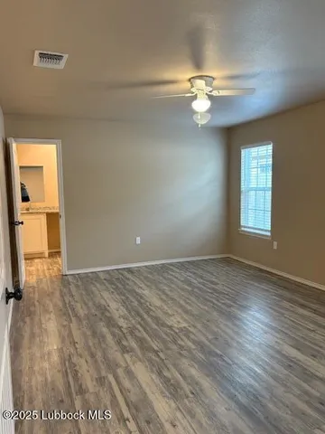 a room with a couch and a window