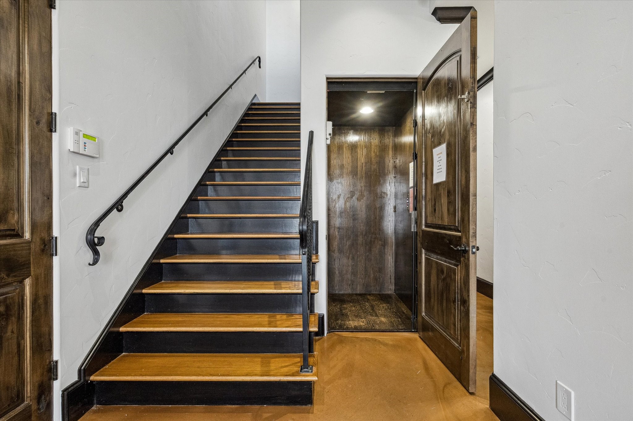 4119 Allen Street Houston, TX 77007 - Photo 12 of 42 Wood paneled elevator