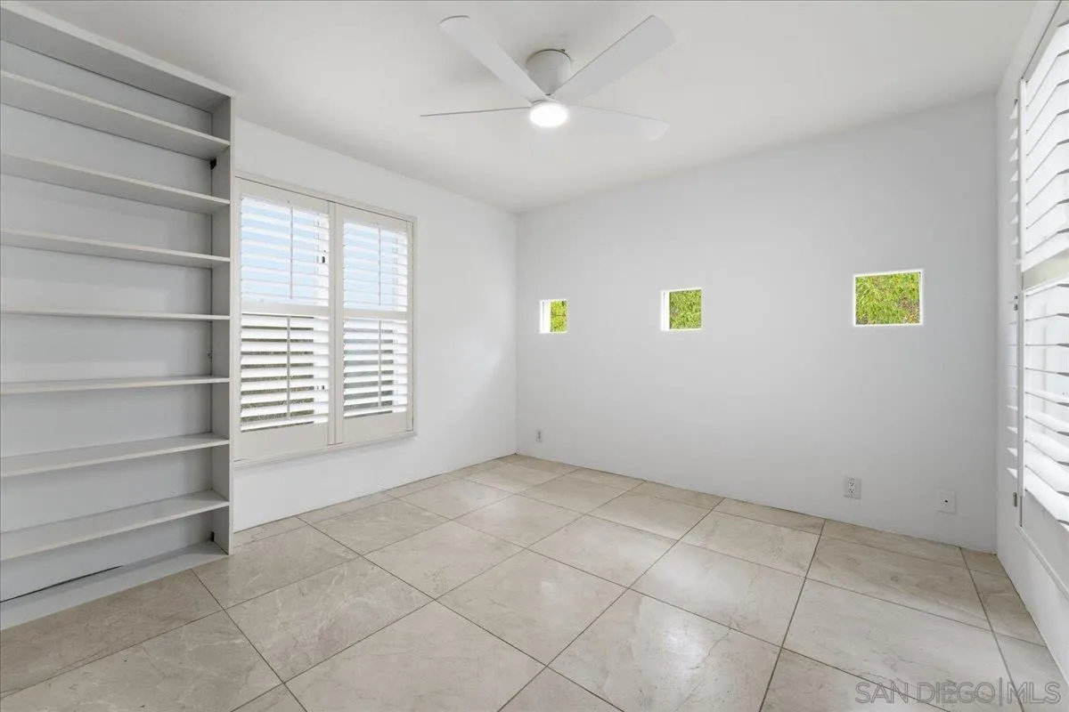 7030 Elfin Oaks Road Escondido, CA 92029 - Photo 14 of 36 a view of an empty room with a window
