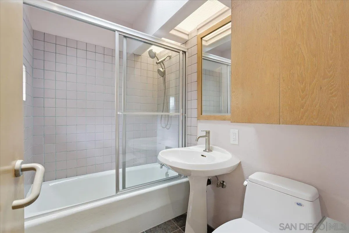 7030 Elfin Oaks Road Escondido, CA 92029 - Photo 32 of 36 a bathroom with a sink toilet and shower